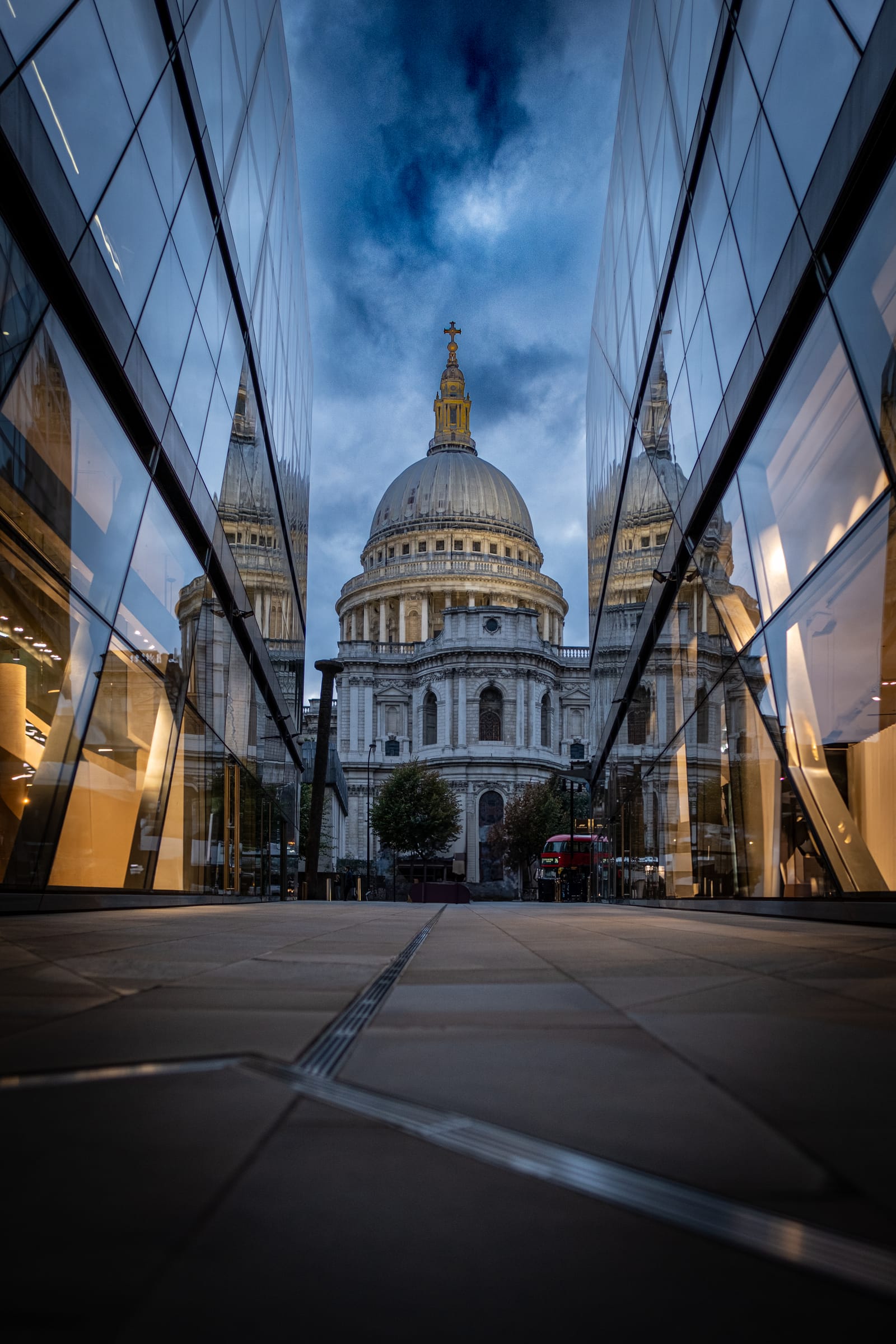 Placeholder caption - London in motion, blurred figures and steady stone.